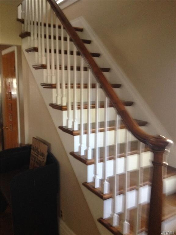 Beautiful hardwood staircase leading to 2nd floor.