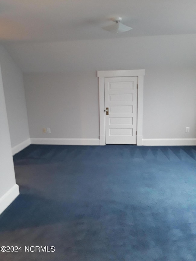 Living Room with storage closet Unit F 2