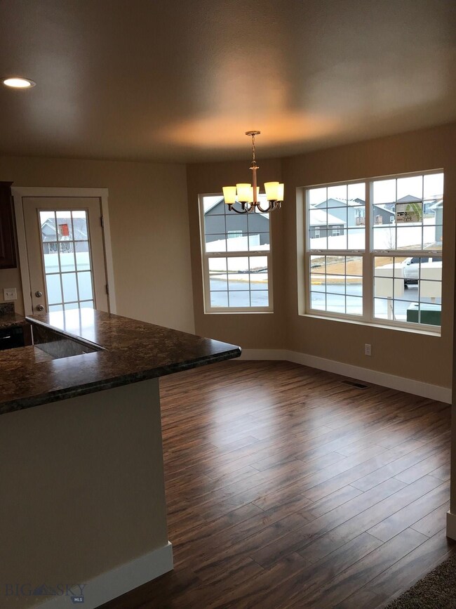 Dining room with bay window. Photo of similar home