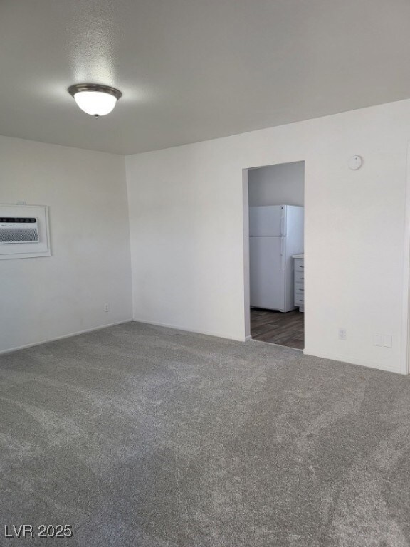 Spare room with carpet flooring