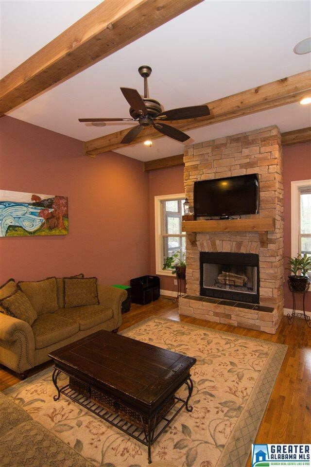 The cedar beams add great detail and charm to this family den - 11ft Ceilings.