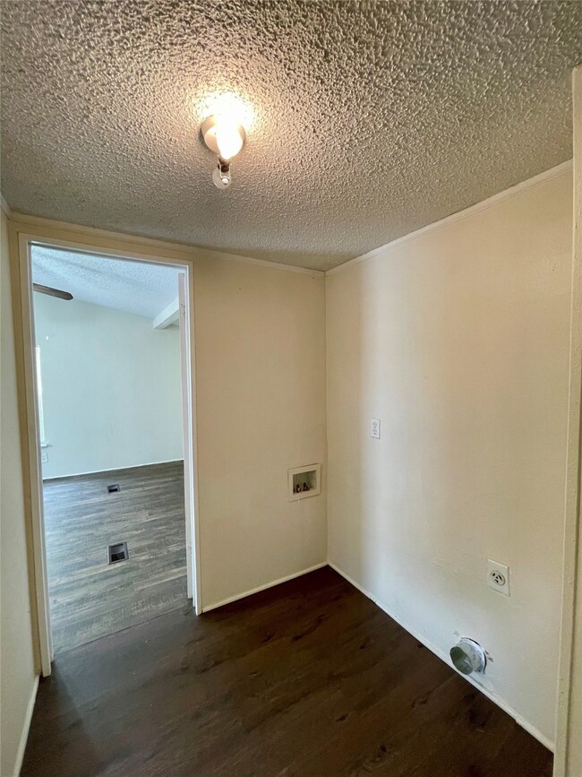 Laundry room has hookups for electric washer and dryer