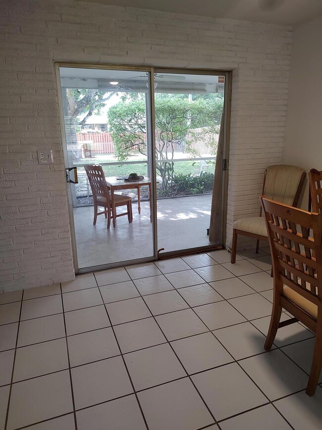 over looks spacious florida porch and vast yard