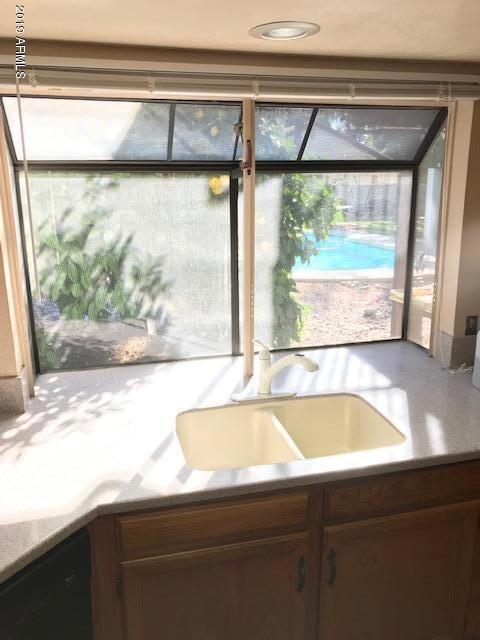 garden window overlooks pool