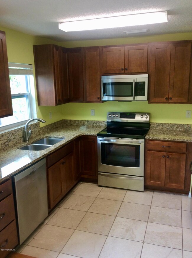 7947 Cherry Blossom Dr N, Jacksonville, FL 32216 - photo 5