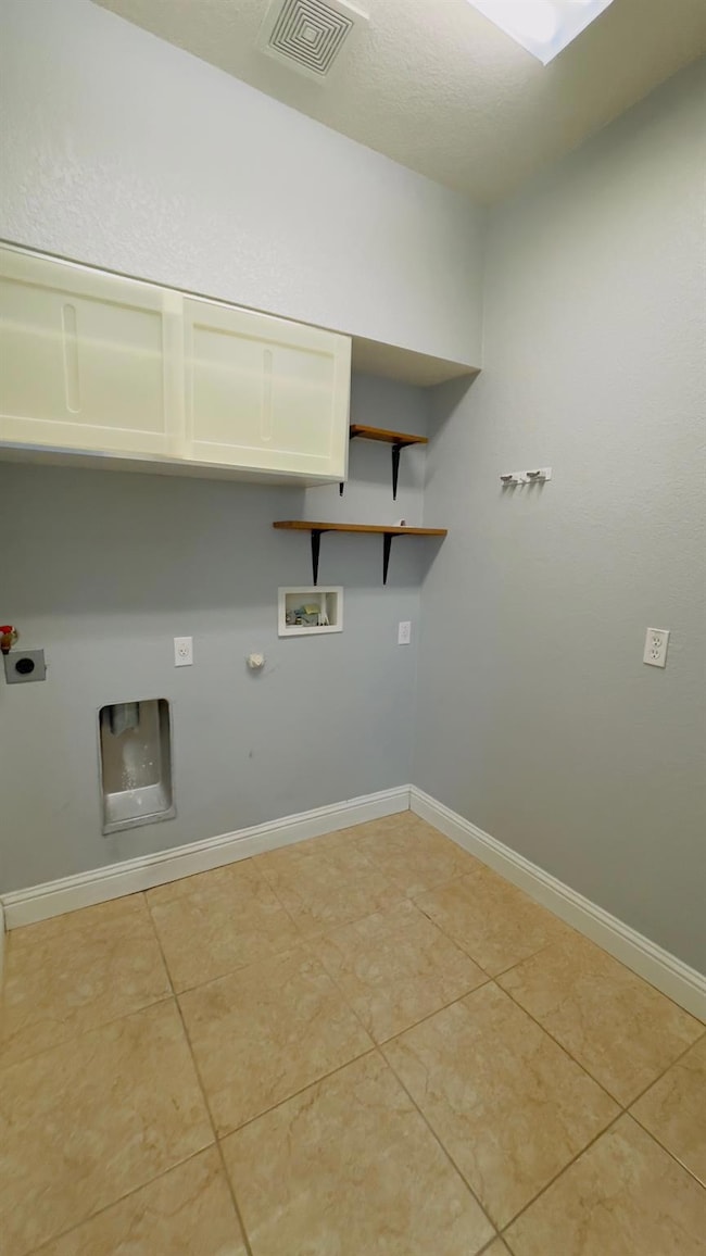 Laundry room featuring laundry area, visible vent