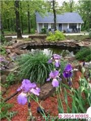 Guest cottage with income producing potential. You