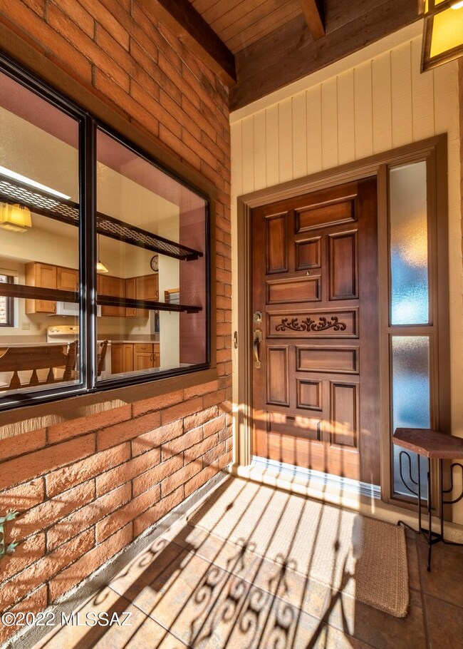 Private entry w/plant shelf window