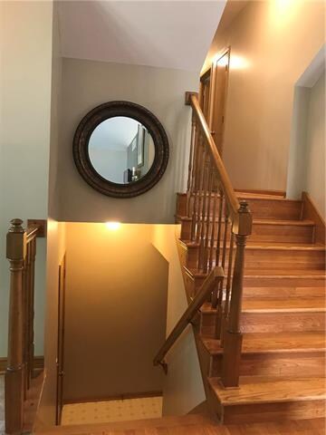 Up to bedrooms down to garage/laundry and finished