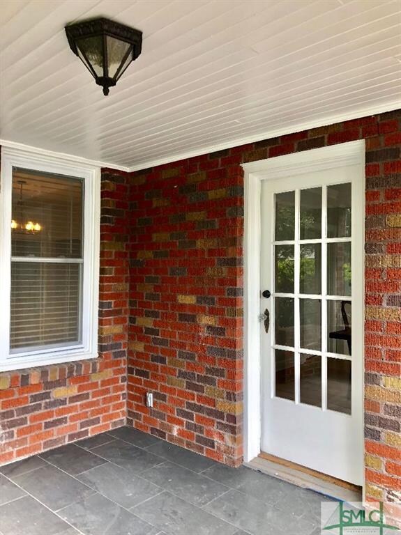 View of the open air porch going into the home.