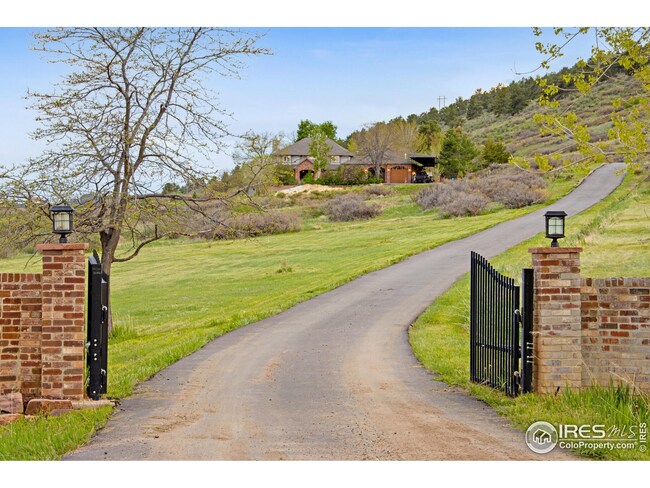 Private Gate and Asphalt Driveway