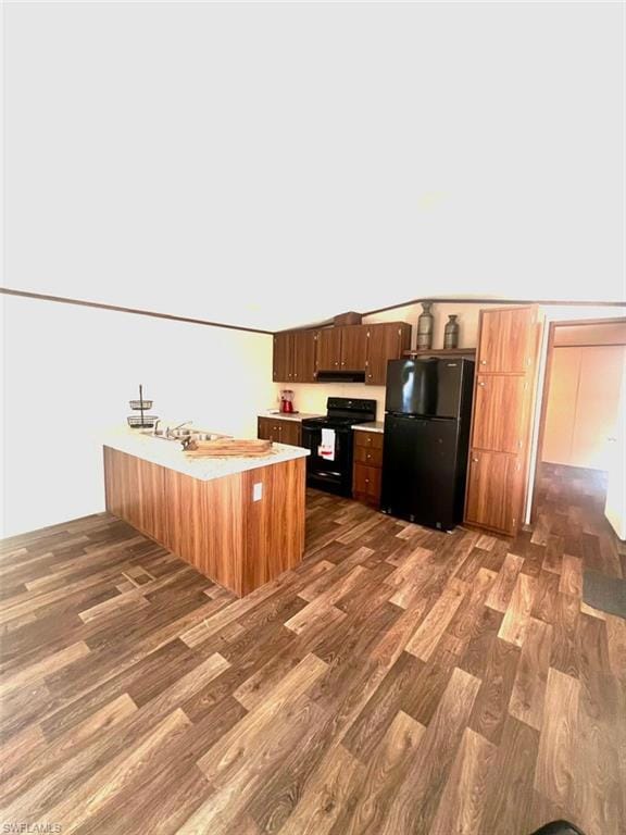 Living room featuring light wood-style flooring.