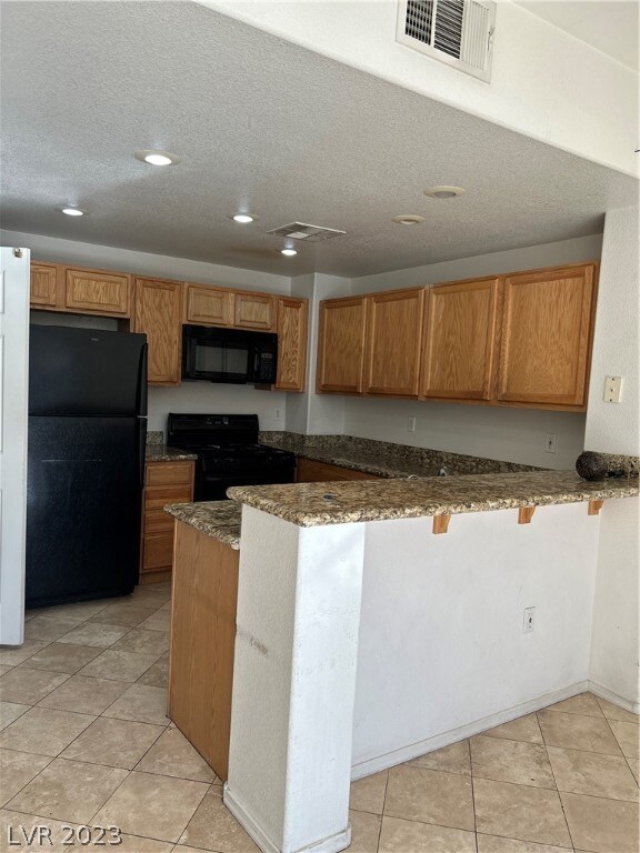 step saver kitchen with pantry and granite counter
