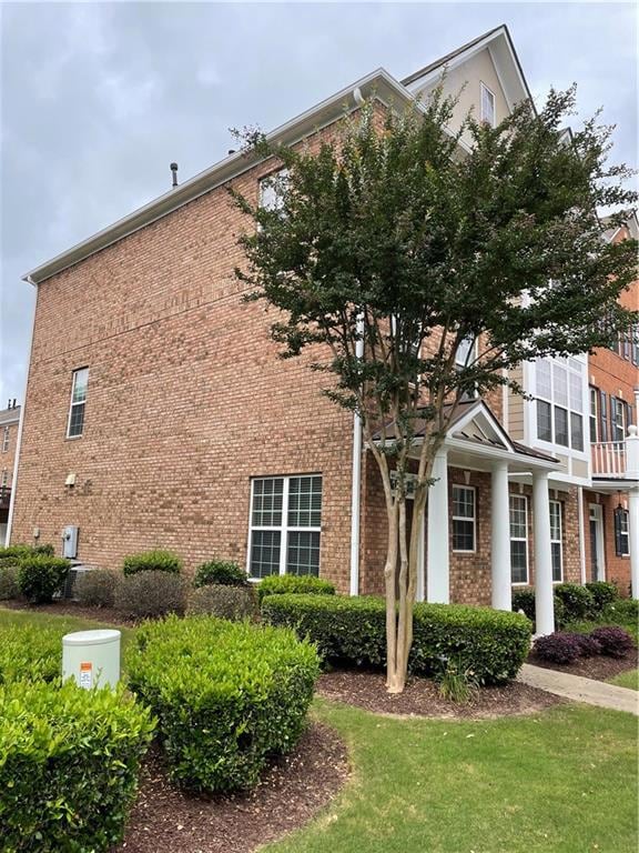 View of home's exterior with brick siding