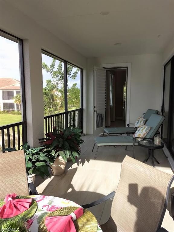 Covered Screen Porch over looking Water Fountain