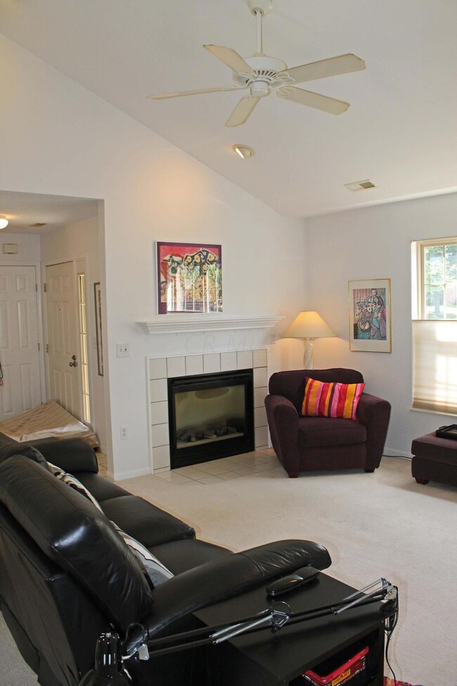 High ceiling with fan, recessed lighting