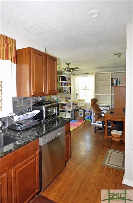 HARD WOOD FLOORS THROUGHOUT THE ENTIRE HOME