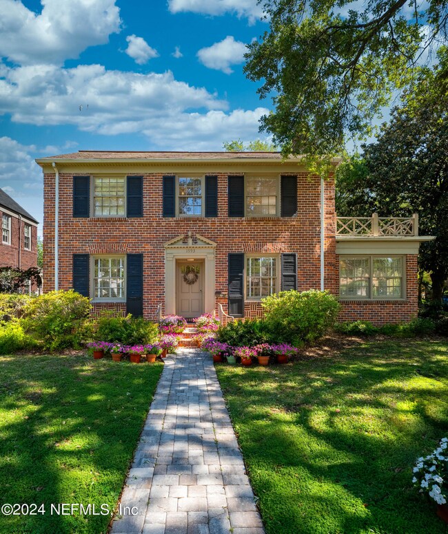 Stunning Curb Appeal Lined by Flowers