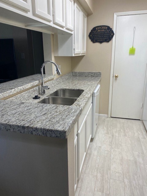 Waterfall edge granite counters and pa. ntry