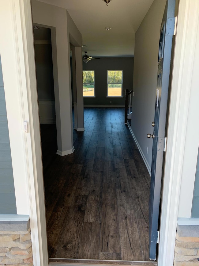 Foyer entrance w/ coat closet and the entire 1st floor w/ laminate flooring.