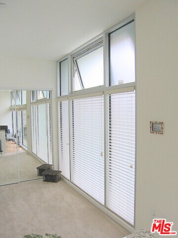 FLOOR TO CEILING WINDOWS. FACING 6TH STREET