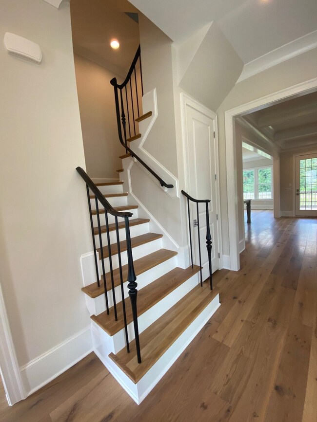 featuring custom iron balusters