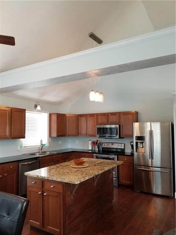 This fabulous island has bar access, cabinets for storage and electricity.