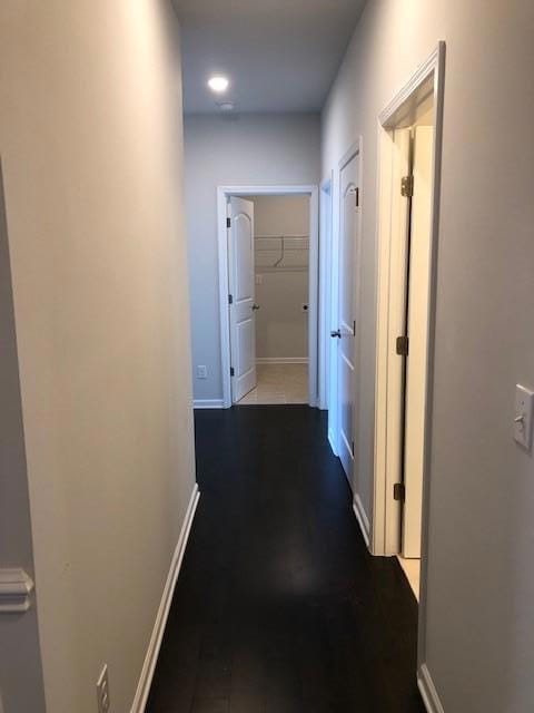 Hallway to 3 bedrooms, laundry and full bath with double sinks - Actual home