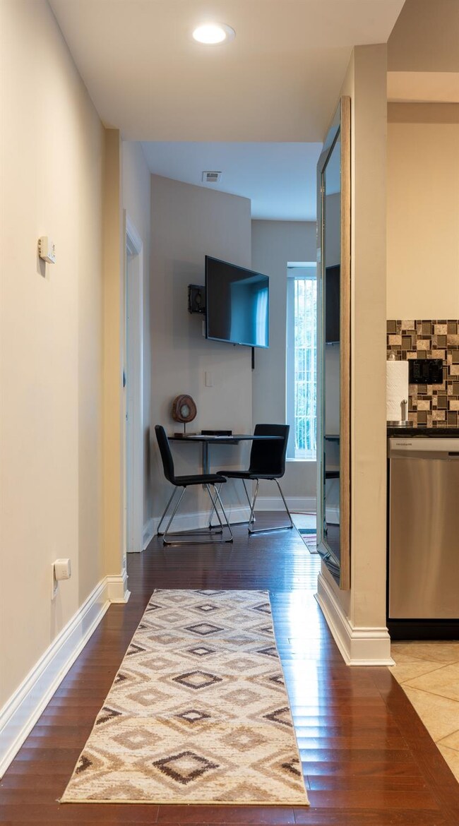 Entry Hall with coat closet and laundry room with 