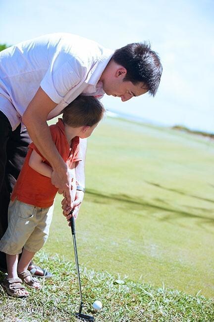Dad & Child Golfing