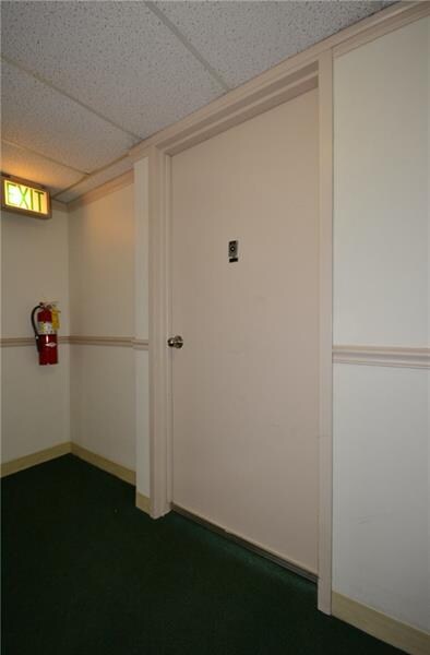 The front door to unit 404. The condo has a large 