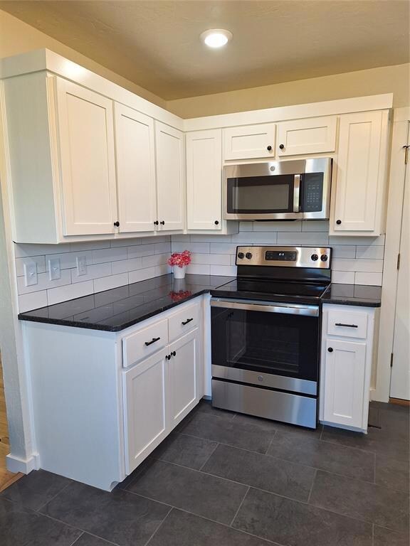 Cooking area of kitchen with all new stainless ste