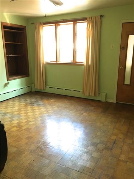 Living Room-Lots of light and great original floor