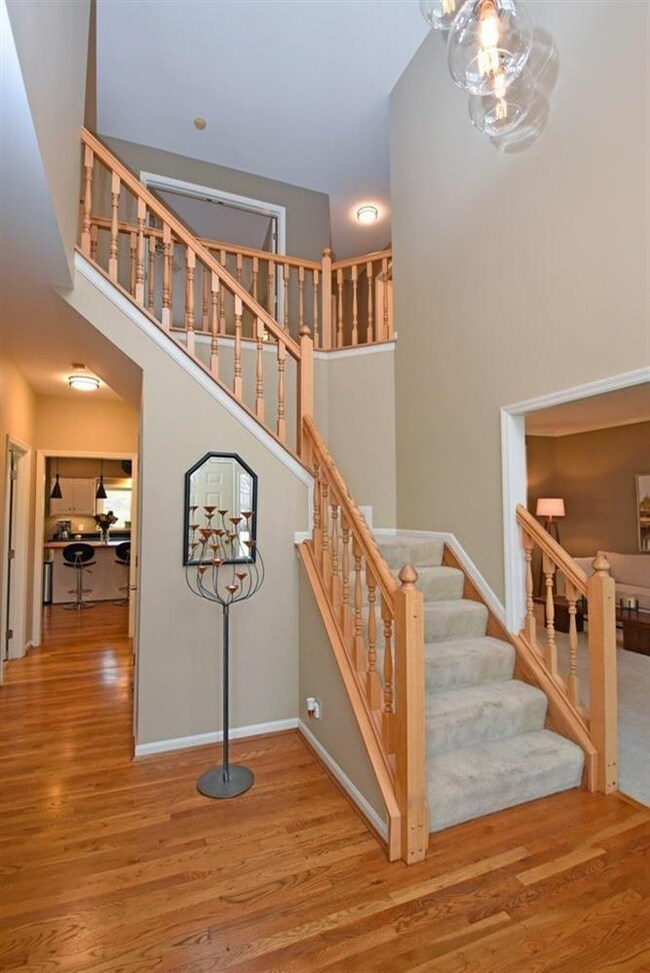Spacious 2 Story Entry features beautiful oak hard