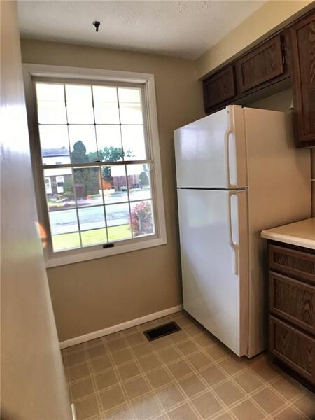 Refrigerator less than 5 years old.  Peek through 