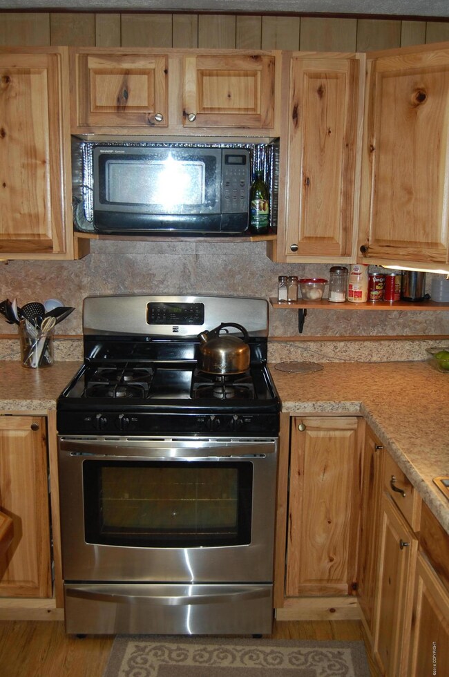 Kitchen range and counter microwave