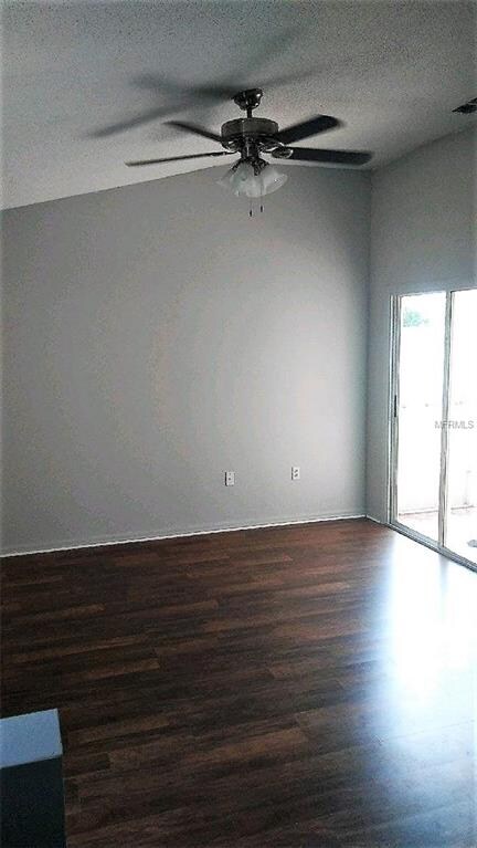 Living Room Looking to sliding glass doors that go
