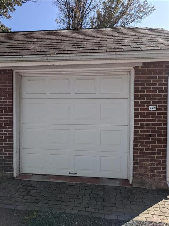 All-brick detached garage with extra storage