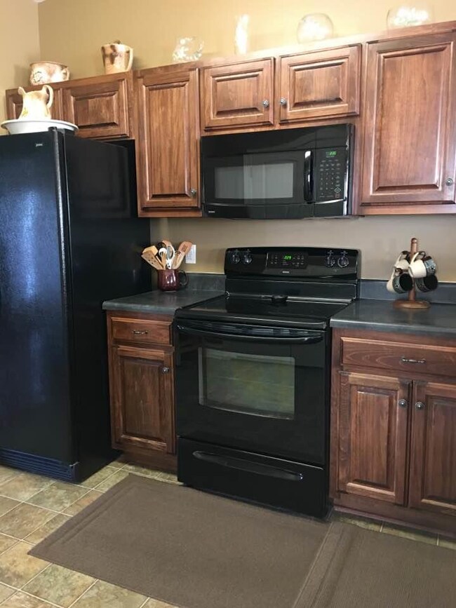 This kitchen is open to the great room and dining room