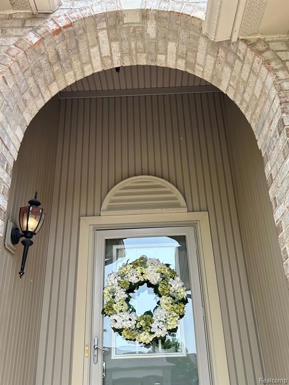 Brick arch covered front entryway!