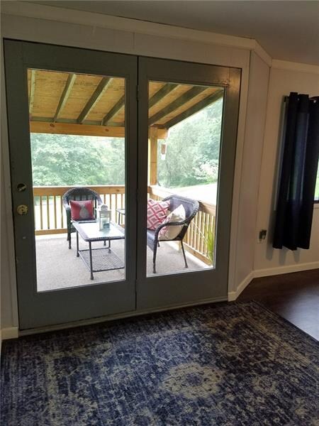 FRENCH DOORS AT FRONT PORCH ENTRANCE