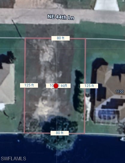 Aerial view of property's location with property p