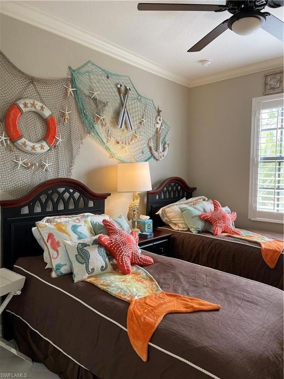 Bedroom featuring crown molding and ceiling fan