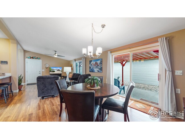 Sliding glass door to patio with pergola