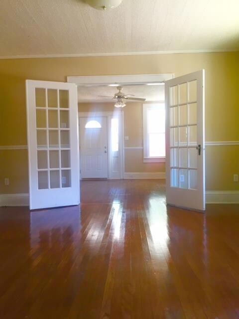 Dinning Room through the French Glass Doors to the Living Room