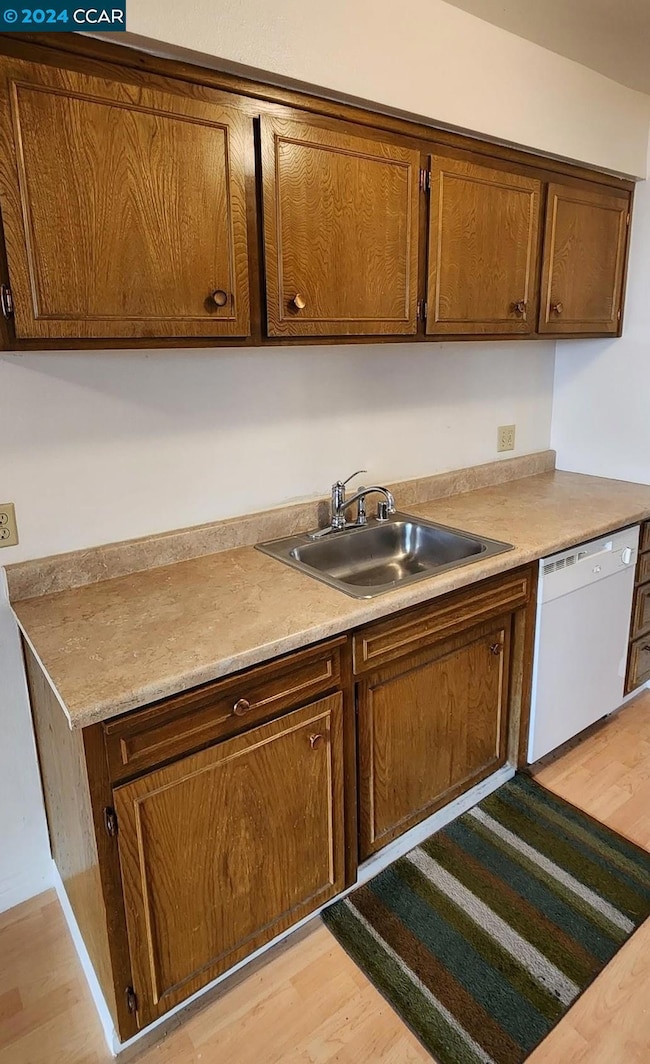 Includes New Faucet, Dishwasher