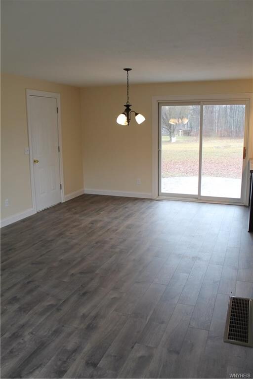 Dining room view with sliding doors to the HUGE ba