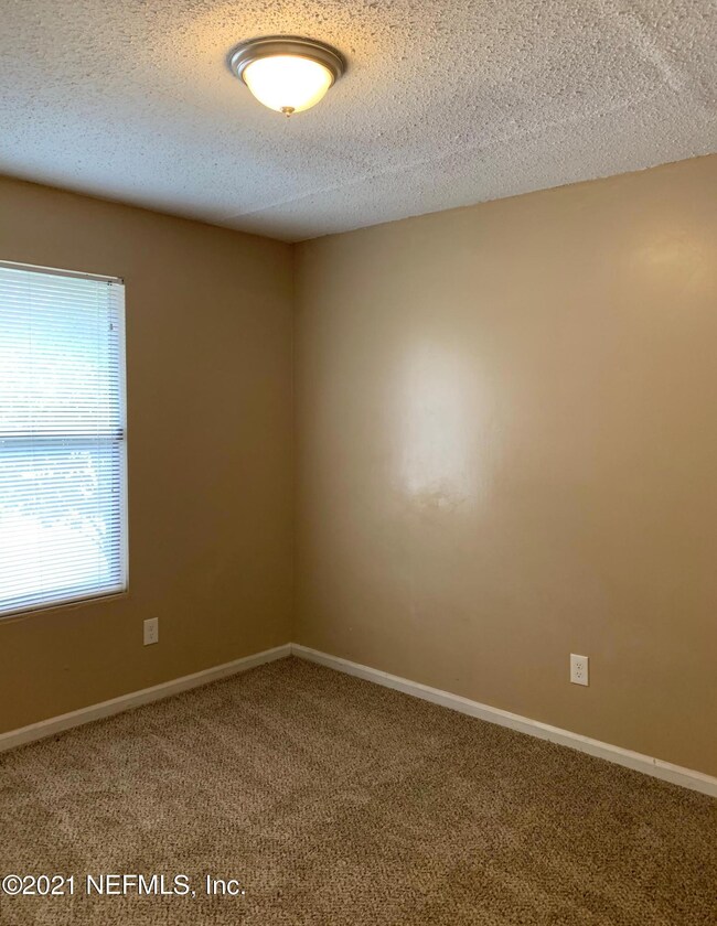 5132 Indian Lakes Ct unit 4, Jacksonville, FL 32210 - photo 2