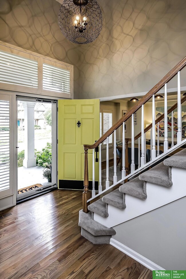 Beautiful 2 story entry with breathtaking new lighting throughout