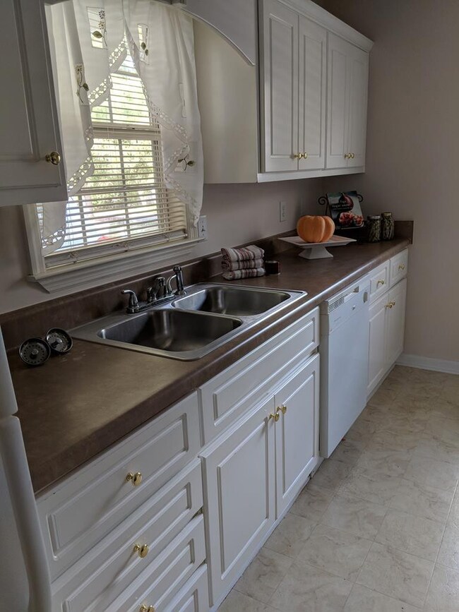 Kitchen has walk-in pantry